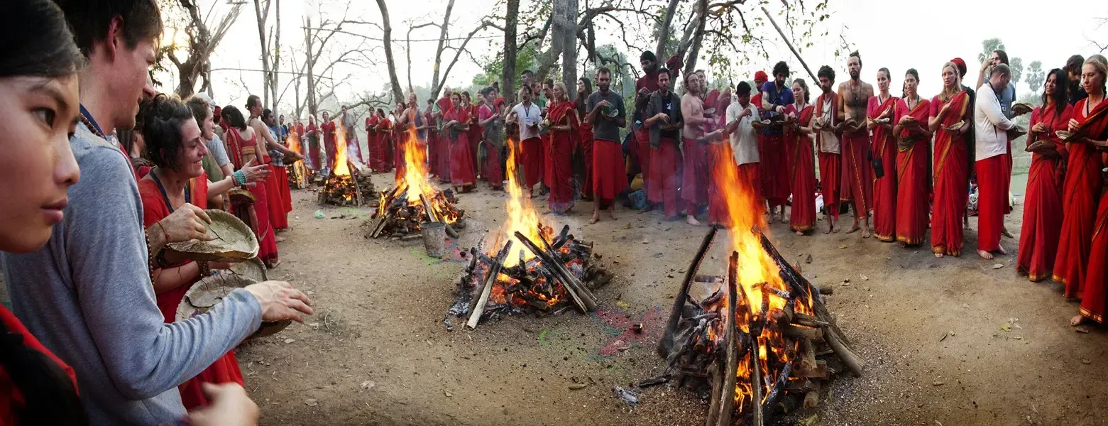 Practitioners gathered around several Yagna ritual fires
